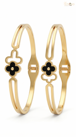 Elegant Gold Bracelet with Black Charm