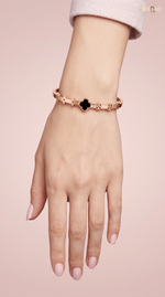 Elegant Gold-Toned Clover Bangle Bracelet