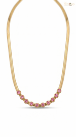 Elegant Gold Necklace with Pink Accents
